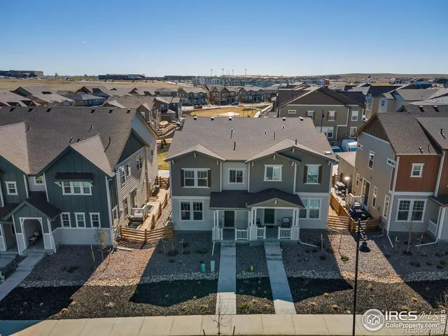 an aerial view of a brick building