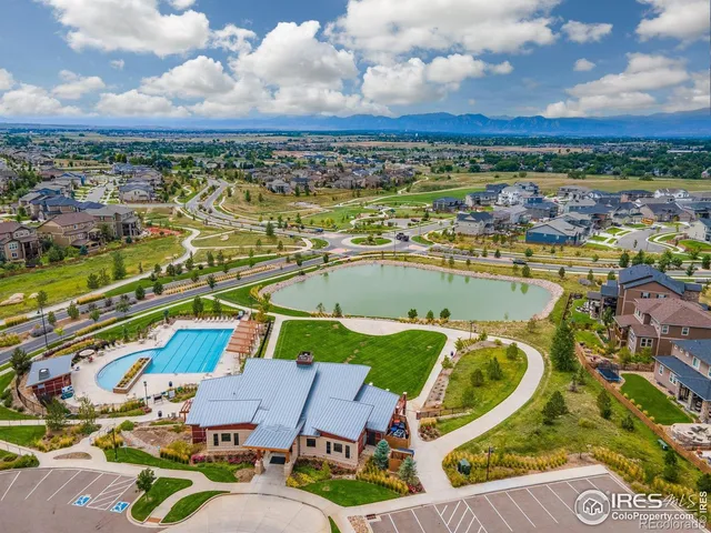 a view of swimming pool from a balcony