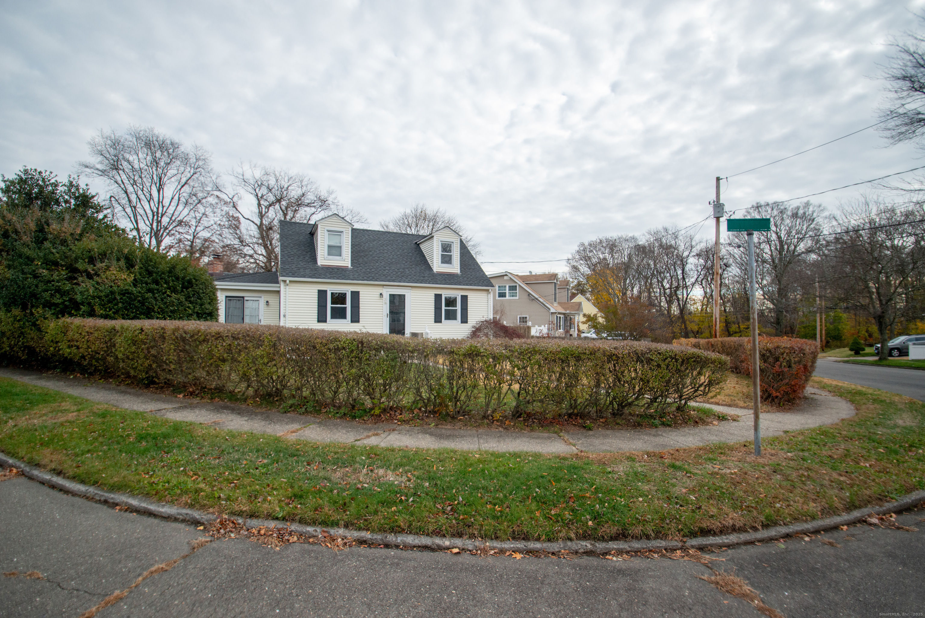 38 Wayland Road Milford, CT 06460 - Photo 2 of 39 a front view of a house with a yard
