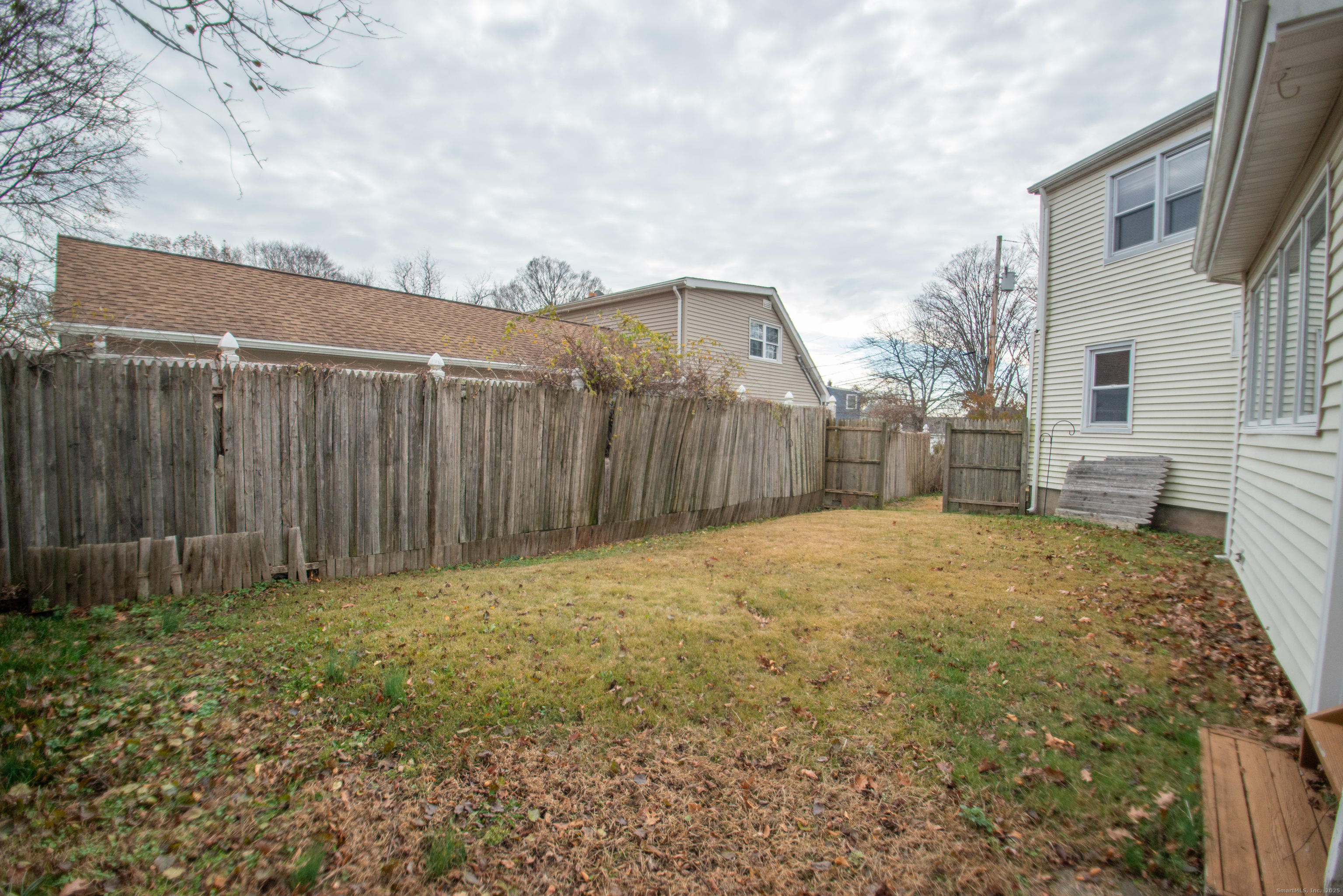 38 Wayland Road Milford, CT 06460 - Photo 8 of 39 a backyard of a house