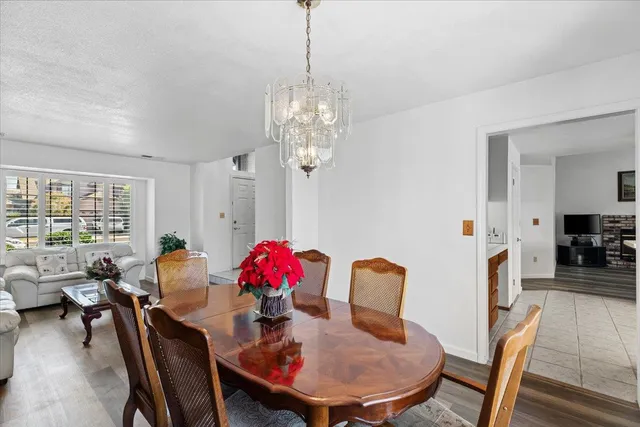 a kitchen with a refrigerator a stove a microwave and cabinets