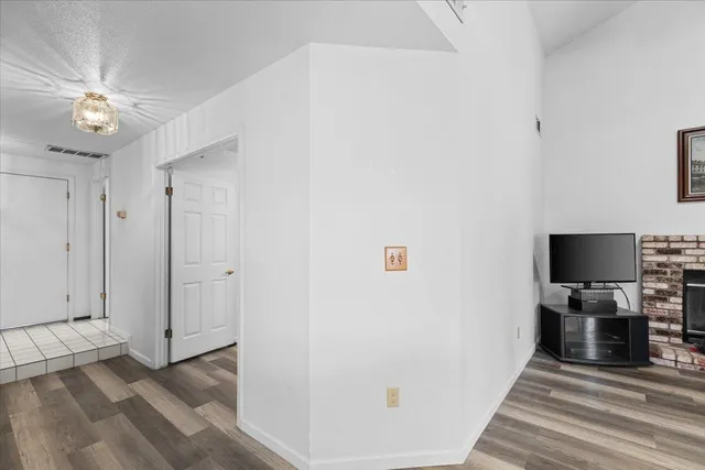 a view of an entryway and livingroom