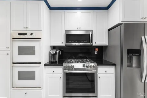 a view of a livingroom with furniture window and outside view
