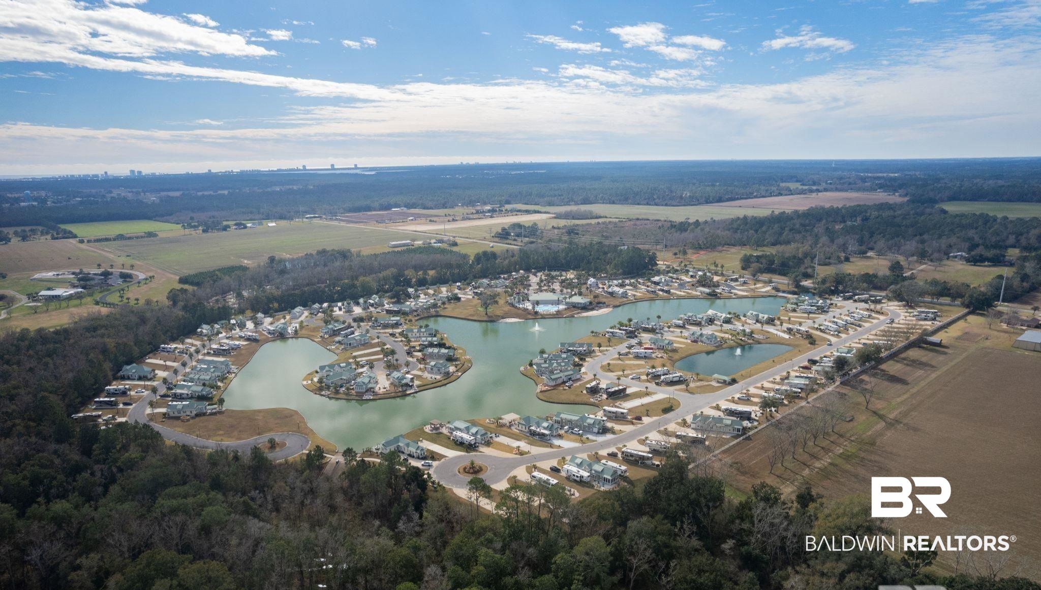 12041 Raptor Court Elberta, AL 36530 - Photo 12 of 32 Aerial view of property and surrounding area featuring a large body of water