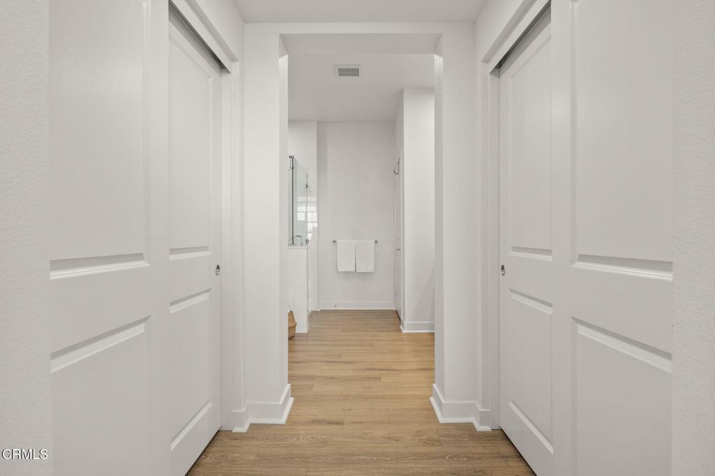2870 Wagon Wheel Road, Unit 401 Oxnard, CA 93036 - Photo 31 of 49 a view of a bathroom with wooden floor
