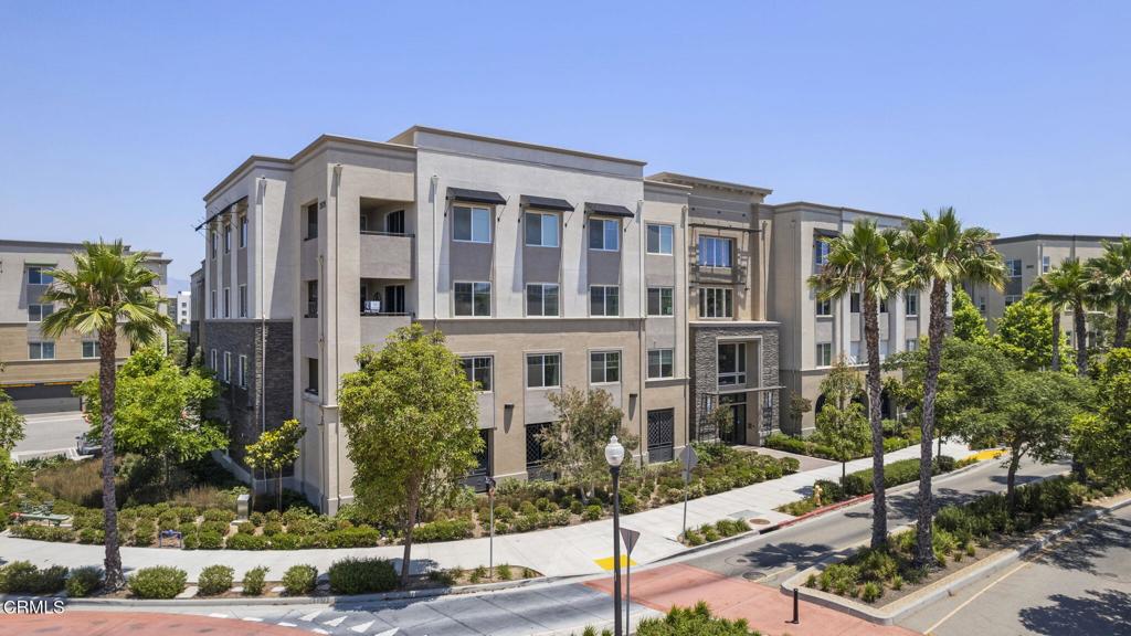 2870 Wagon Wheel Road, Unit 401 Oxnard, CA 93036 - Photo 40 of 49 a front view of a building with tree s