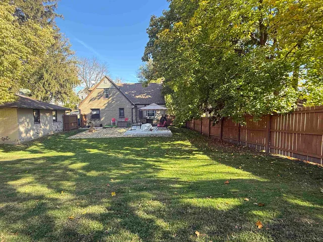 a view of a house with a swimming pool