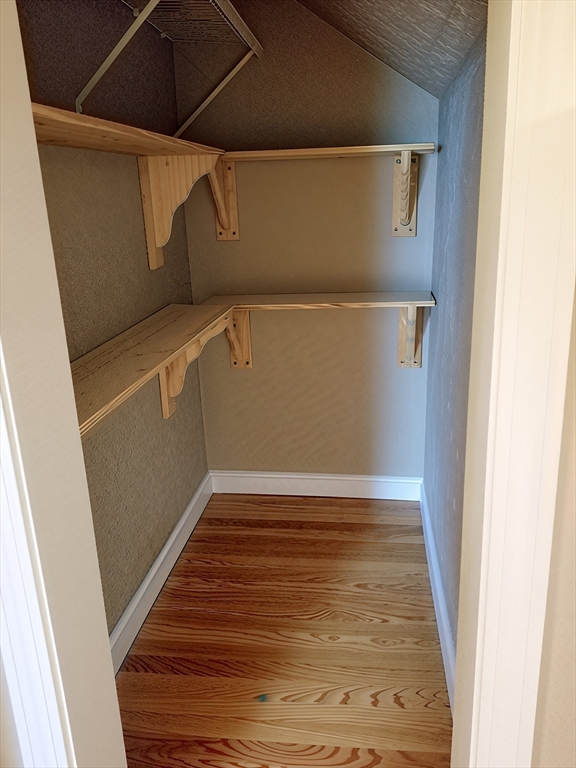 84 Cross Street Somerville, MA 02145 - Photo 29 of 42 a view of a room with wooden floor