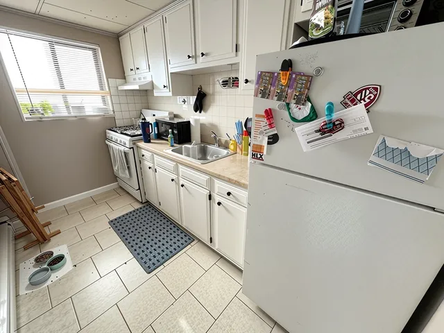 a bathroom with sink and toilet