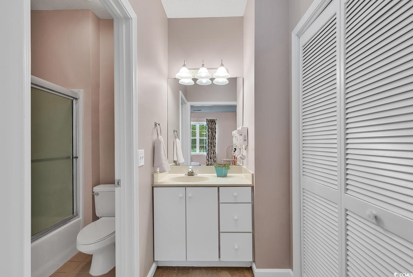 4608 Arran Court, Unit E Myrtle Beach, SC 29579 - Photo 15 of 39 View of carpeted bedroom