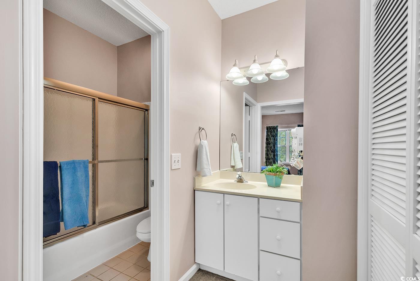 4608 Arran Court, Unit E Myrtle Beach, SC 29579 - Photo 16 of 39 Full bathroom featuring enclosed tub / shower comb