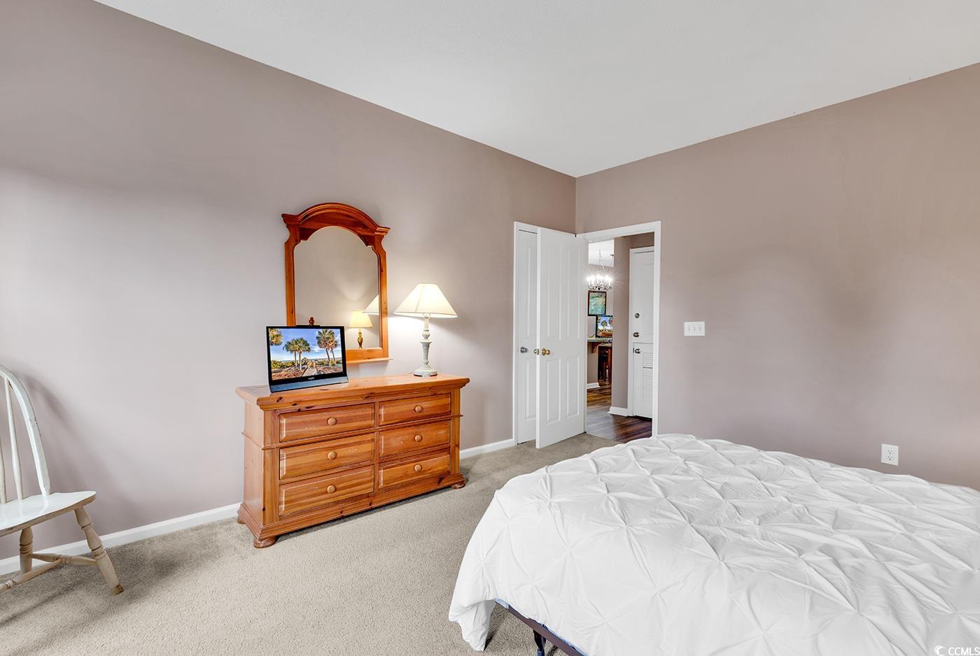 4608 Arran Court, Unit E Myrtle Beach, SC 29579 - Photo 19 of 39 View of carpeted bedroom