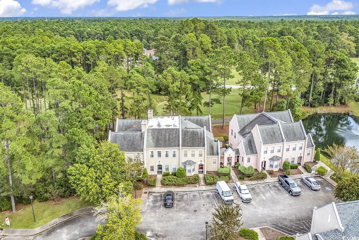 4608 Arran Court, Unit E Myrtle Beach, SC 29579 - Photo 26 of 39 Bedroom featuring wood-type flooring, a notable ch