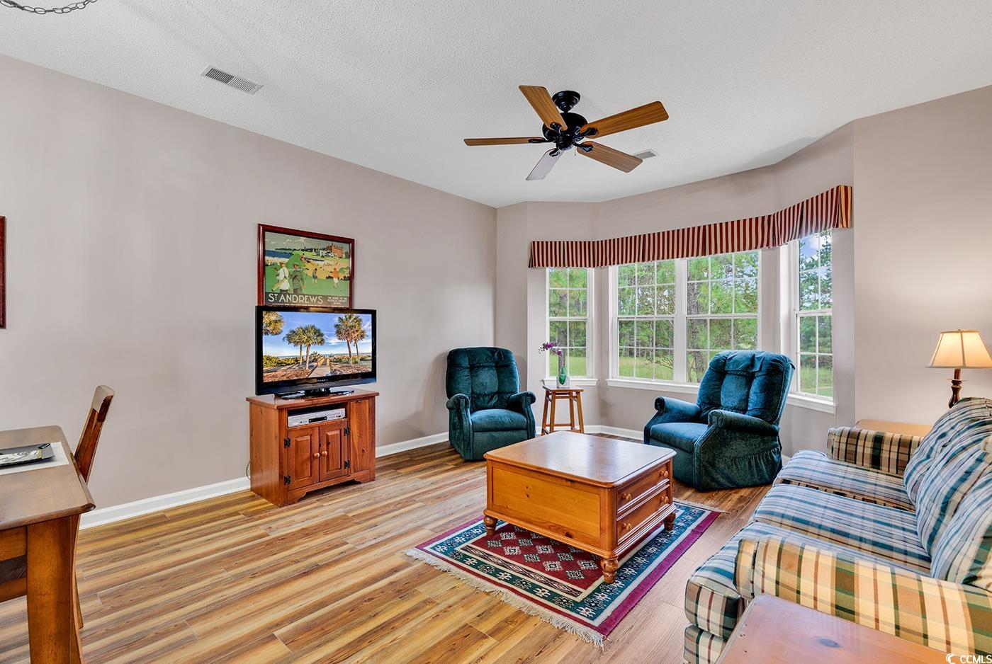 4608 Arran Court, Unit E Myrtle Beach, SC 29579 - Photo 7 of 39 Dining room featuring a textured ceiling, an invit
