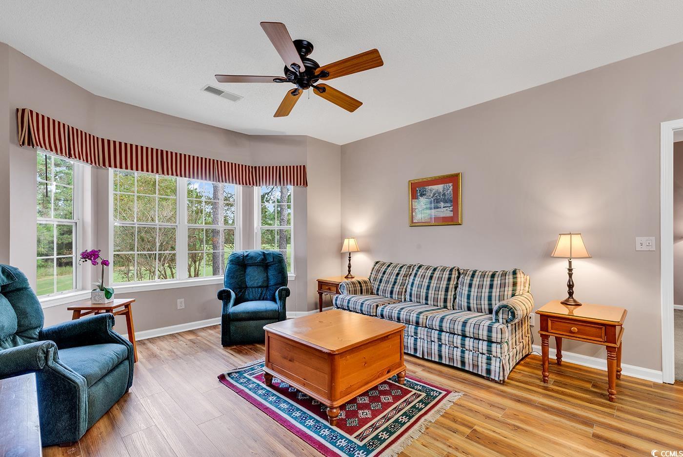 4608 Arran Court, Unit E Myrtle Beach, SC 29579 - Photo 10 of 39 Dining space with an inviting chandelier, light ha