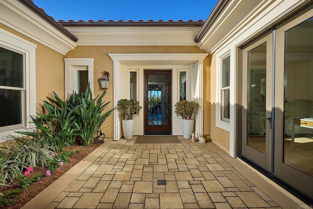 15527 Artesian Ridge San Diego, CA 92127 - Photo 2 of 25 a entryway view with a outdoor space