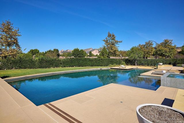 a view of outdoor space yard swimming pool and lake view