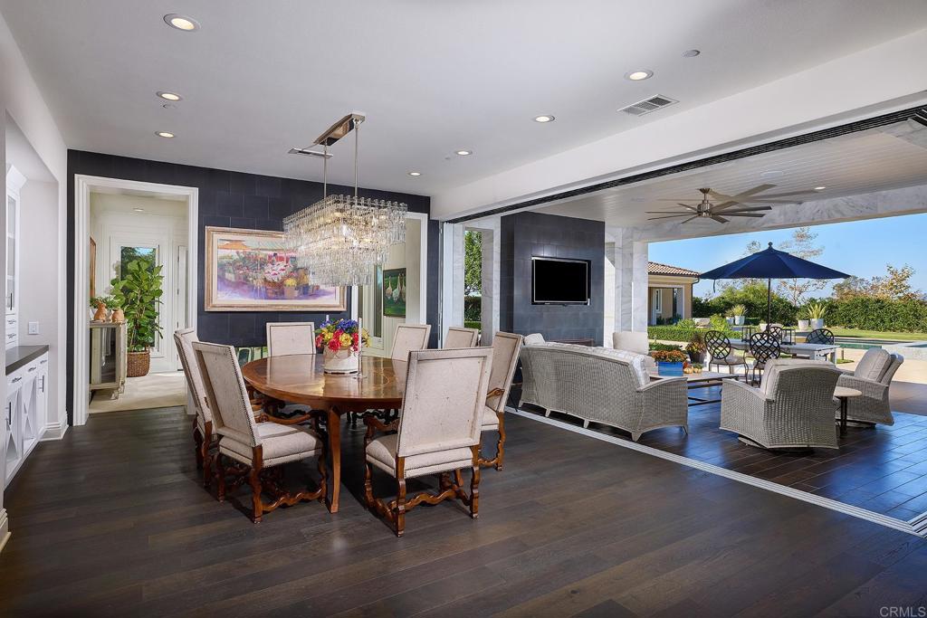15527 Artesian Ridge San Diego, CA 92127 - Photo 9 of 25 a dining room with furniture window and wooden floor