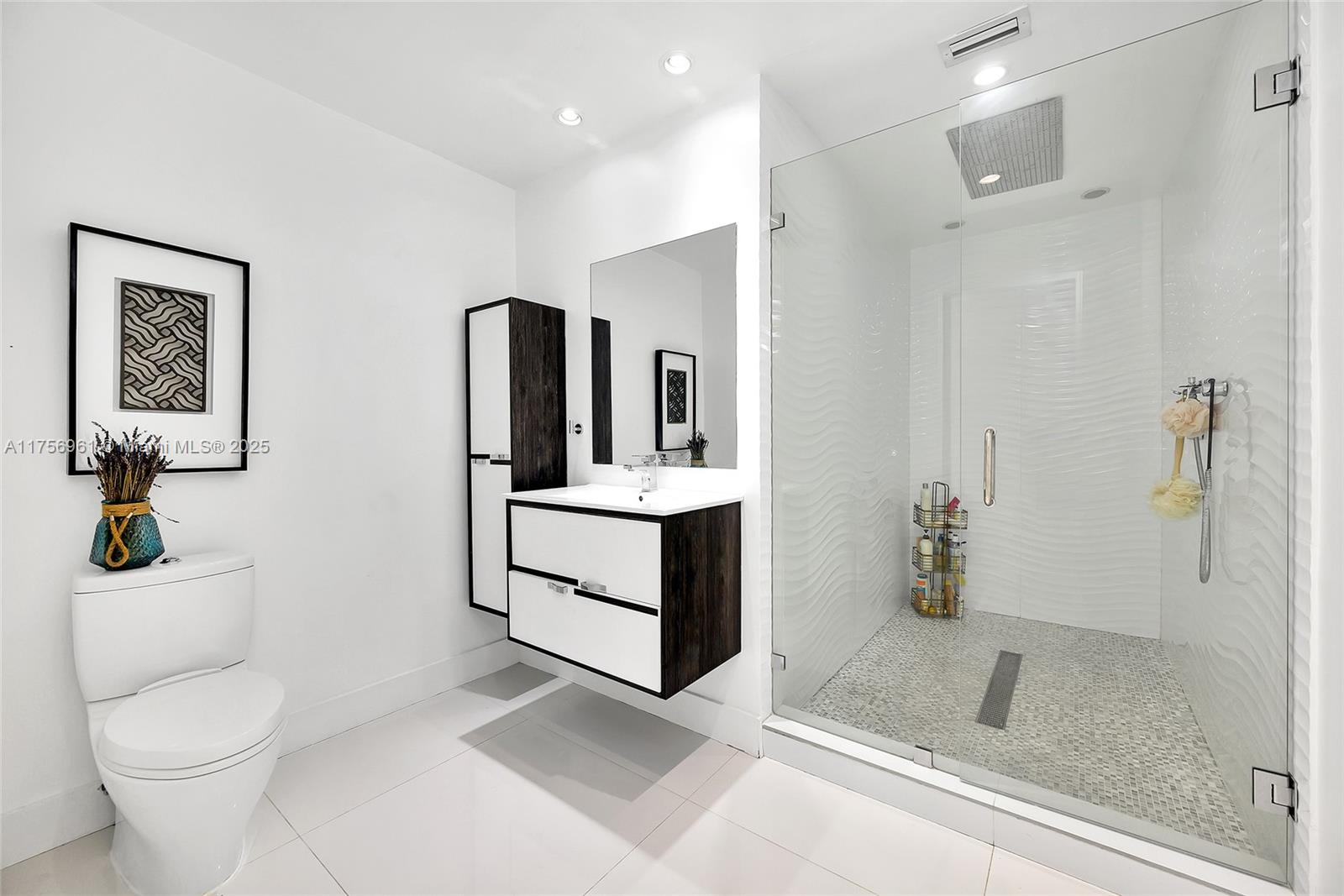 2120 Northeast 204th Street Miami, FL 33179 - Photo 36 of 52 a bathroom with a sink toilet and shower