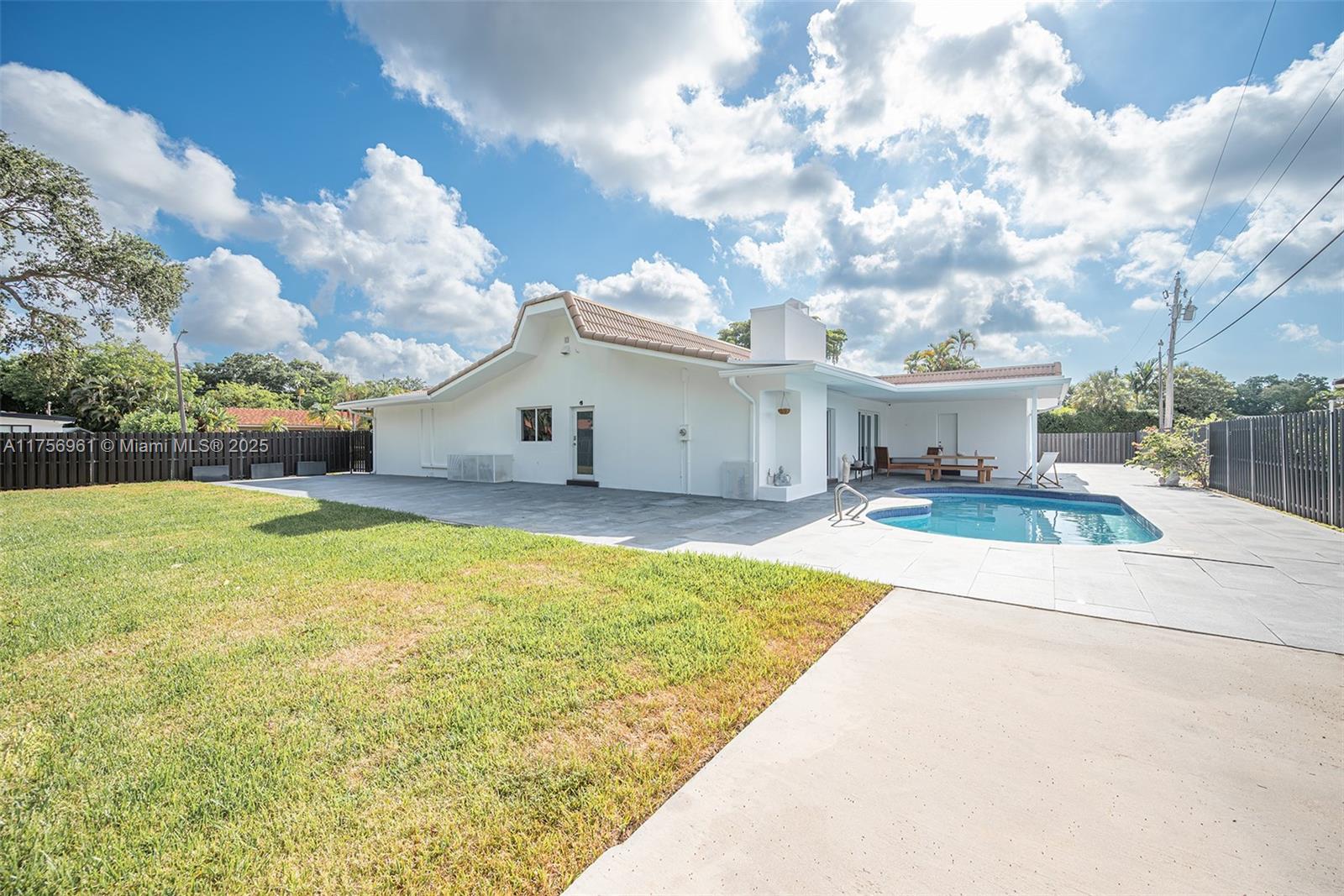 2120 Northeast 204th Street Miami, FL 33179 - Photo 41 of 52 a view of house with yard and entertaining space