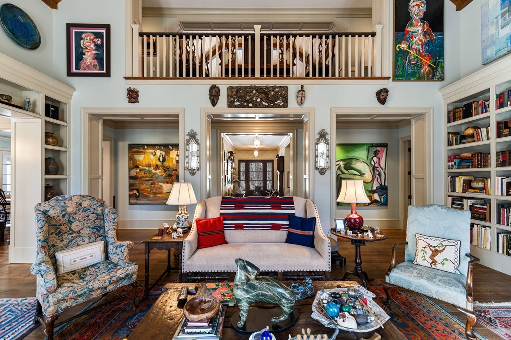 490 Red Wolf Run Franklin, NC 28734 - Photo 25 of 83 a living room with furniture and a book shelf