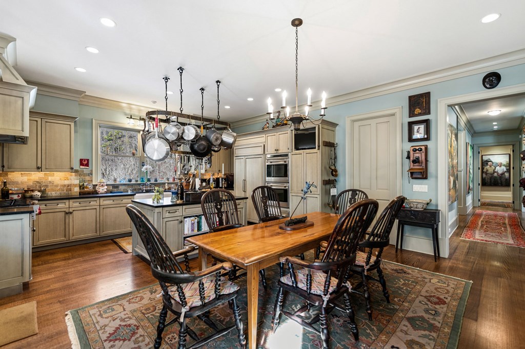 490 Red Wolf Run Franklin, NC 28734 - Photo 27 of 83 a view of a dining room with furniture and wooden floor