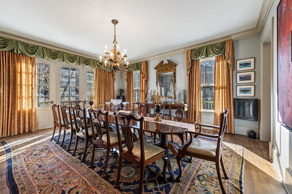 490 Red Wolf Run Franklin, NC 28734 - Photo 40 of 83 a view of a dining room with furniture window and wooden floor