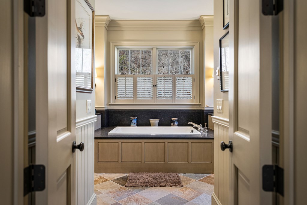 490 Red Wolf Run Franklin, NC 28734 - Photo 47 of 83 a bathroom with a sink and a mirror