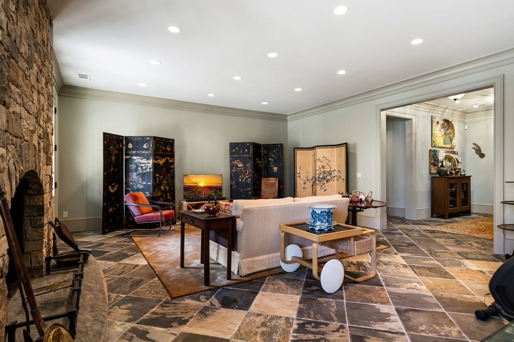 490 Red Wolf Run Franklin, NC 28734 - Photo 71 of 83 a living room with furniture a rug and a large window