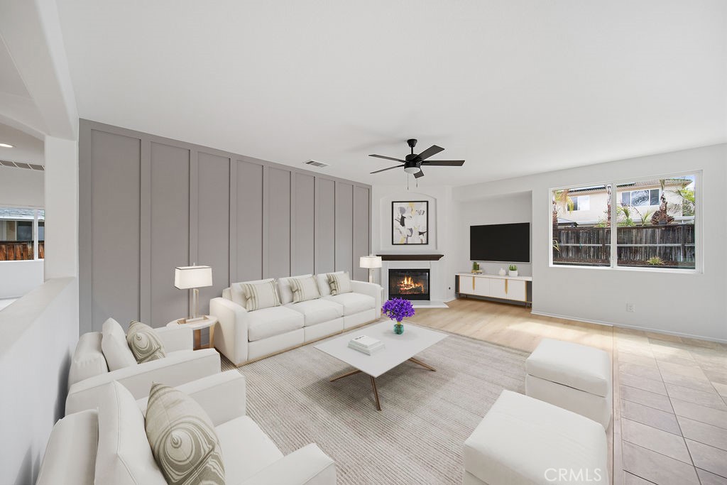 32591 Breton Drive Winchester, CA 92596 - Photo 2 of 21 a living room with furniture and a flat screen tv