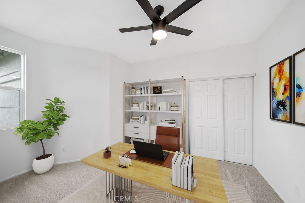 32591 Breton Drive Winchester, CA 92596 - Photo 5 of 21 a work room with furniture and wooden floor