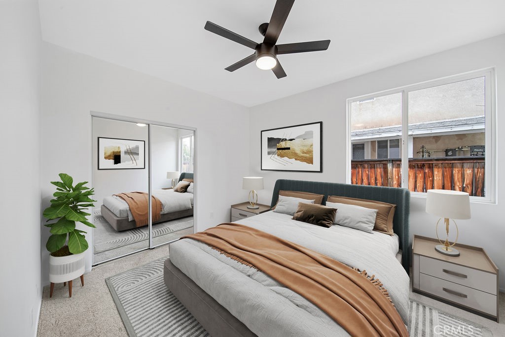 32591 Breton Drive Winchester, CA 92596 - Photo 8 of 21 a bedroom with a large bed and a couch