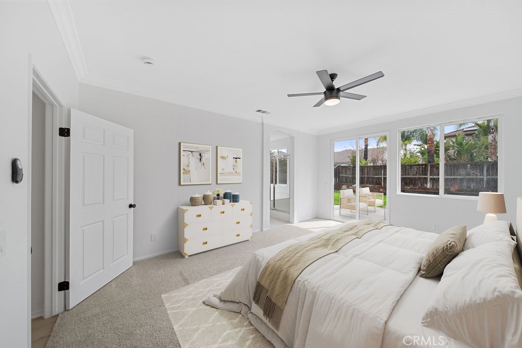 32591 Breton Drive Winchester, CA 92596 - Photo 9 of 21 a bedroom with a large bed and a window