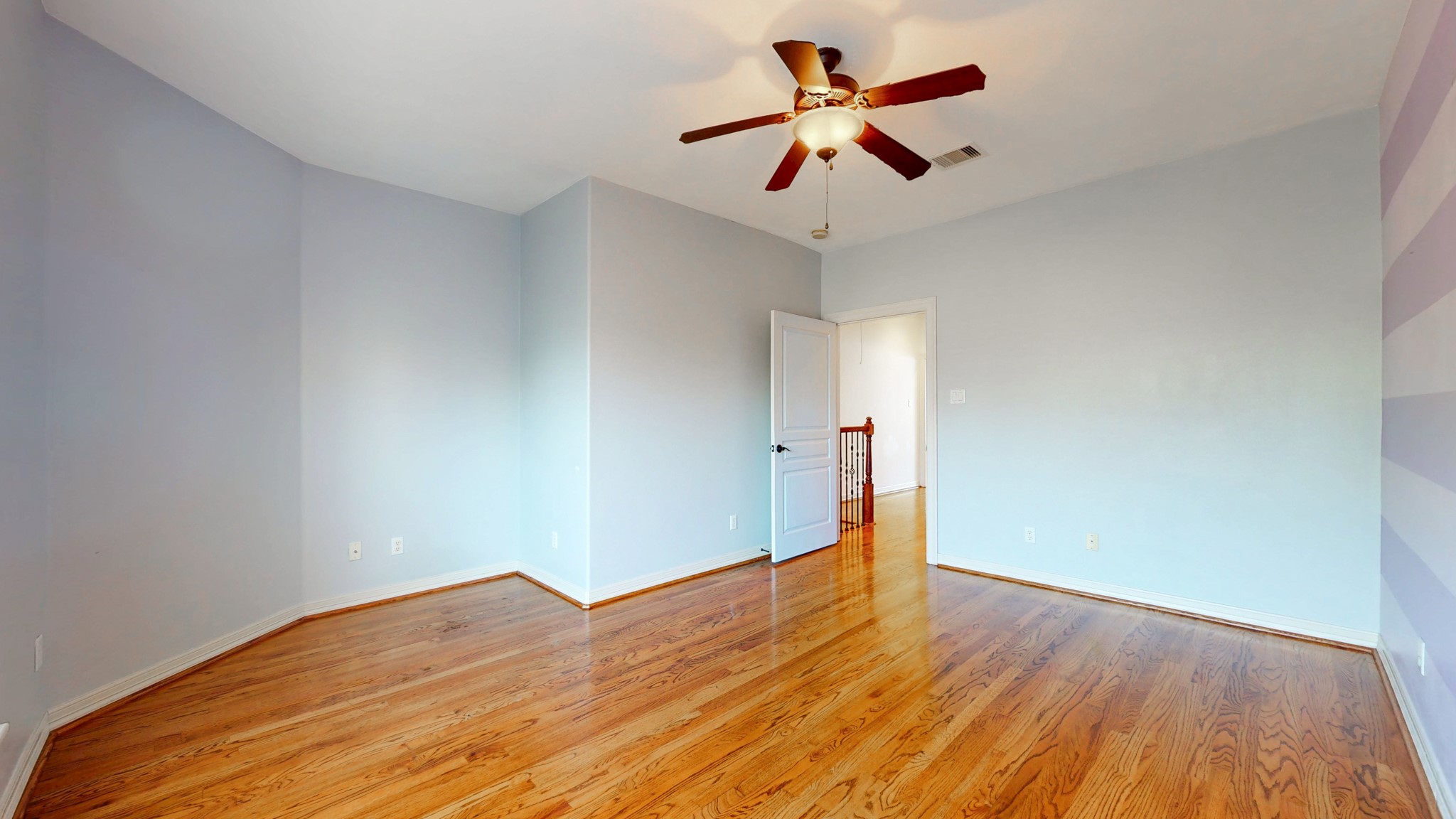 2540 Prospect Street, Unit B Houston, TX 77004 - Photo 16 of 18 wooden floor in an empty room