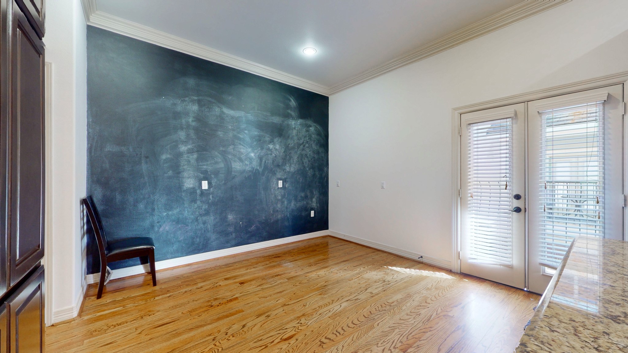2540 Prospect Street, Unit B Houston, TX 77004 - Photo 7 of 18 wooden floor in an empty room with a window