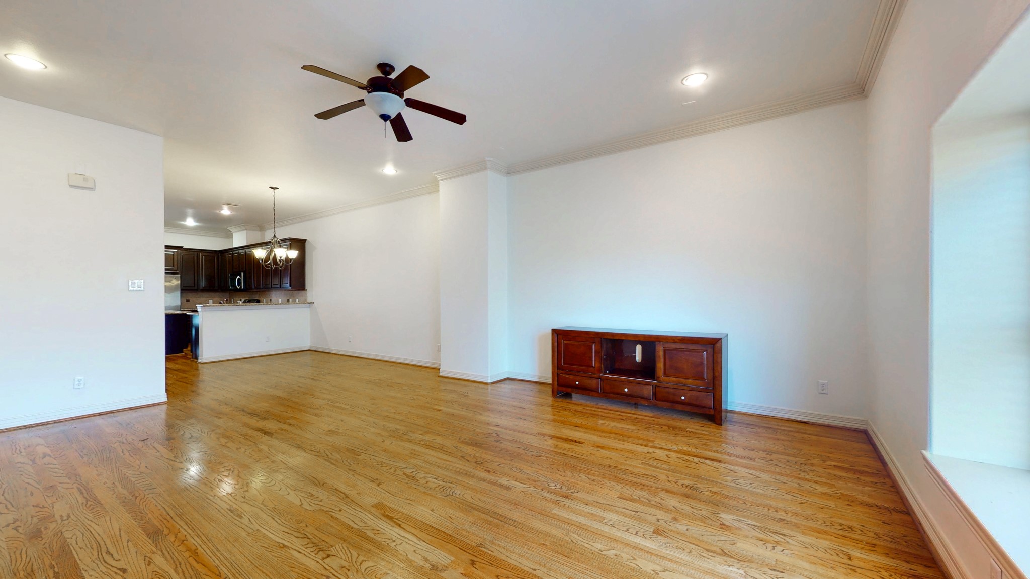 2540 Prospect Street, Unit B Houston, TX 77004 - Photo 10 of 18 a view of an empty room with a kitchen