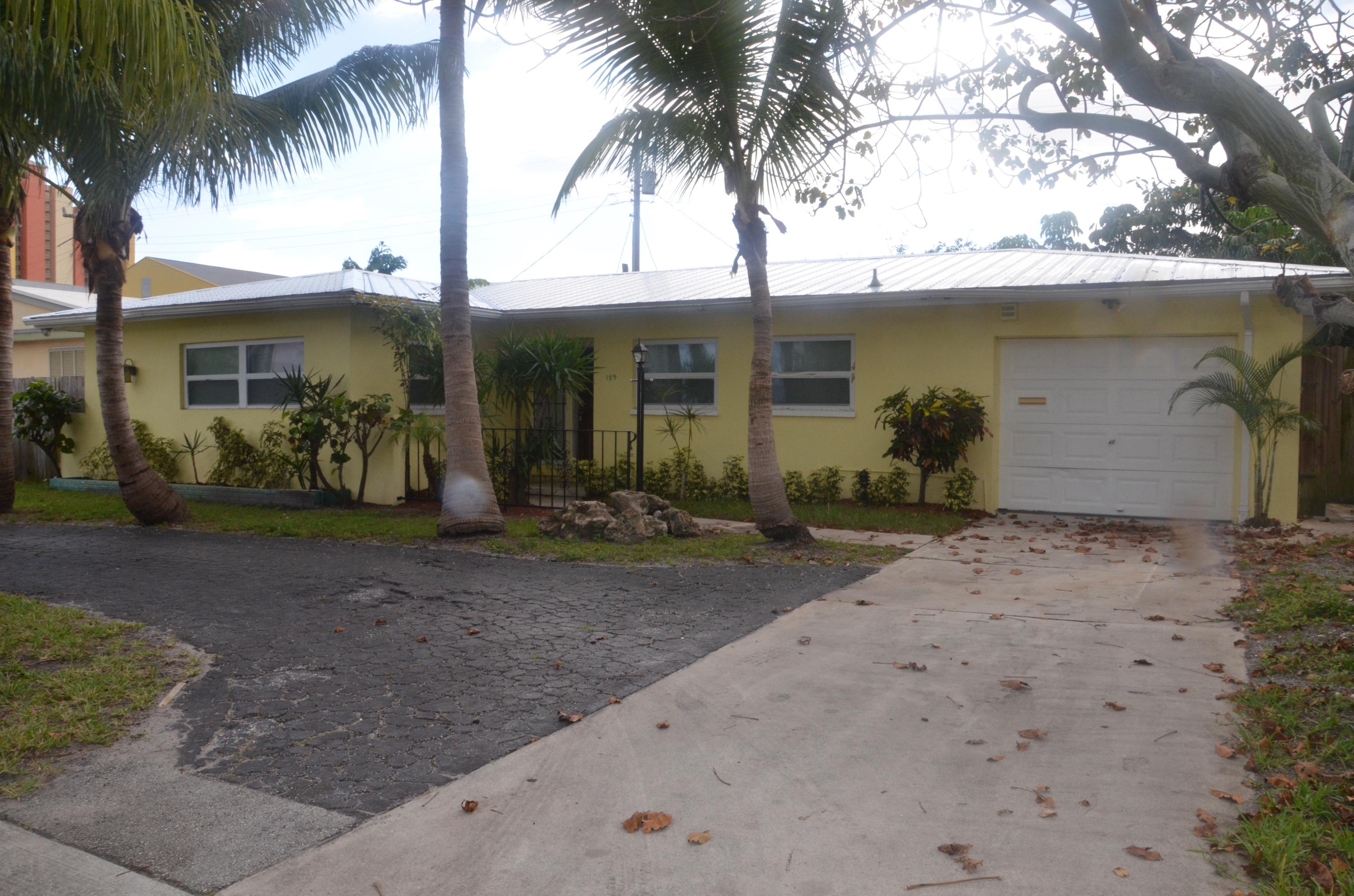 189 East 30th Street Riviera Beach, FL 33404 - Photo 1 of 12 Front
