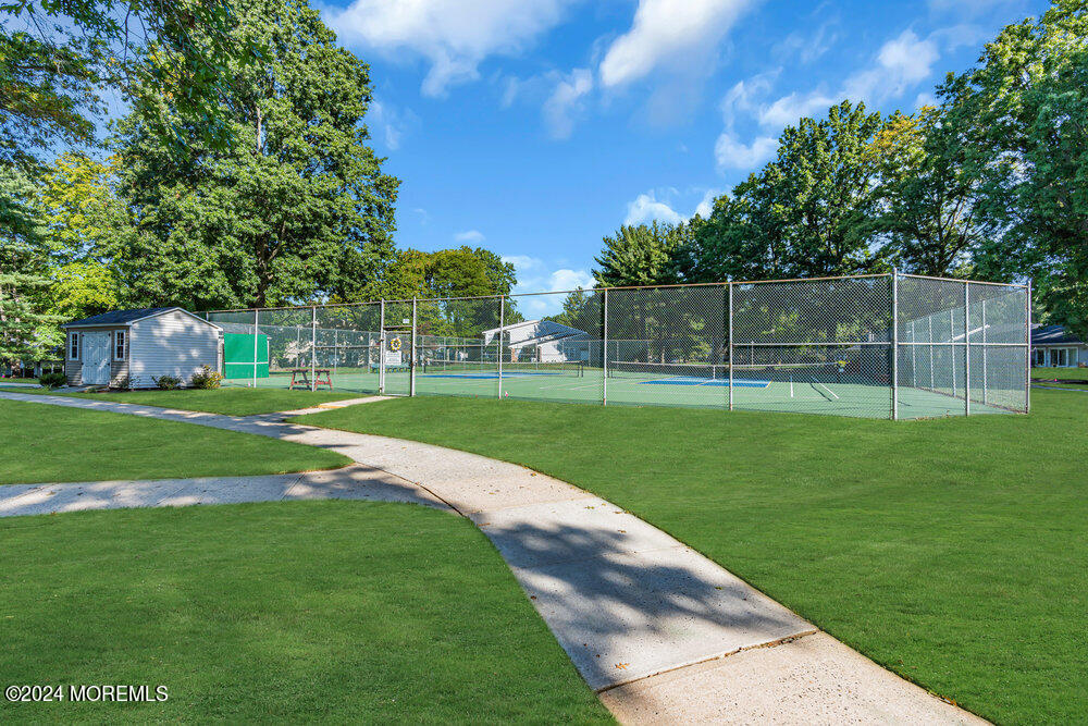 39 Firethorn Circle, Unit 339 Red Bank, NJ 07701 - Photo 13 of 16 a view of a park and entertaining space