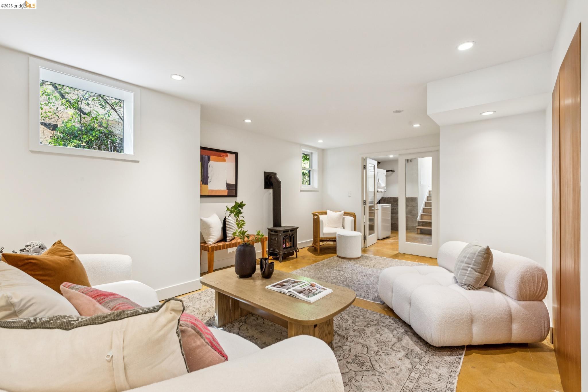 1490 Arch Street Berkeley, CA 94708 - Photo 37 of 57 a living room with furniture and a table
