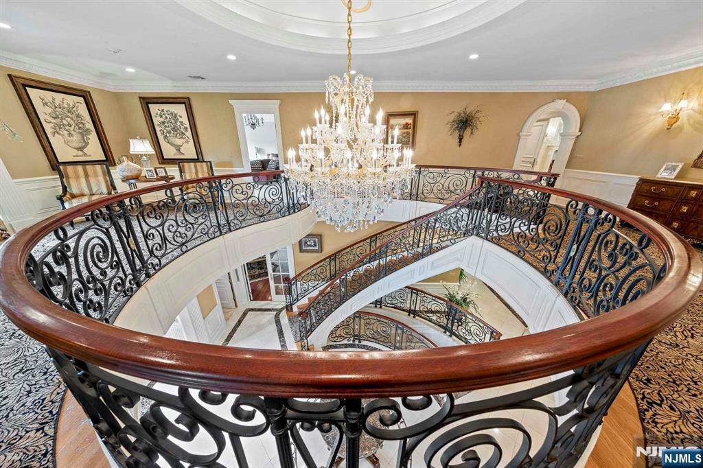196 Vaccaro Drive Alpine, NJ 07620 - Photo 39 of 50 a view of a dining room with furniture window and wooden floor