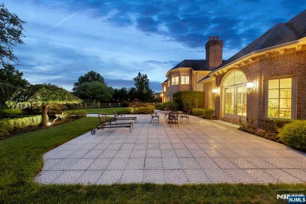 a view of a pathway with a yard