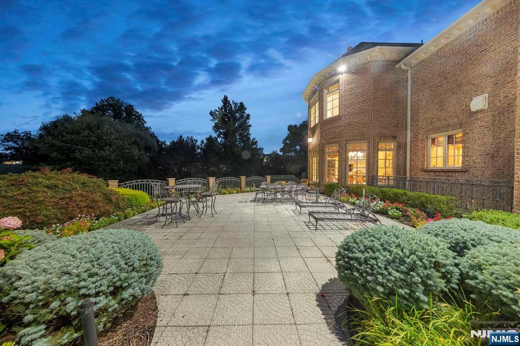 196 Vaccaro Drive Alpine, NJ 07620 - Photo 9 of 50 a view of a pathway with a yard