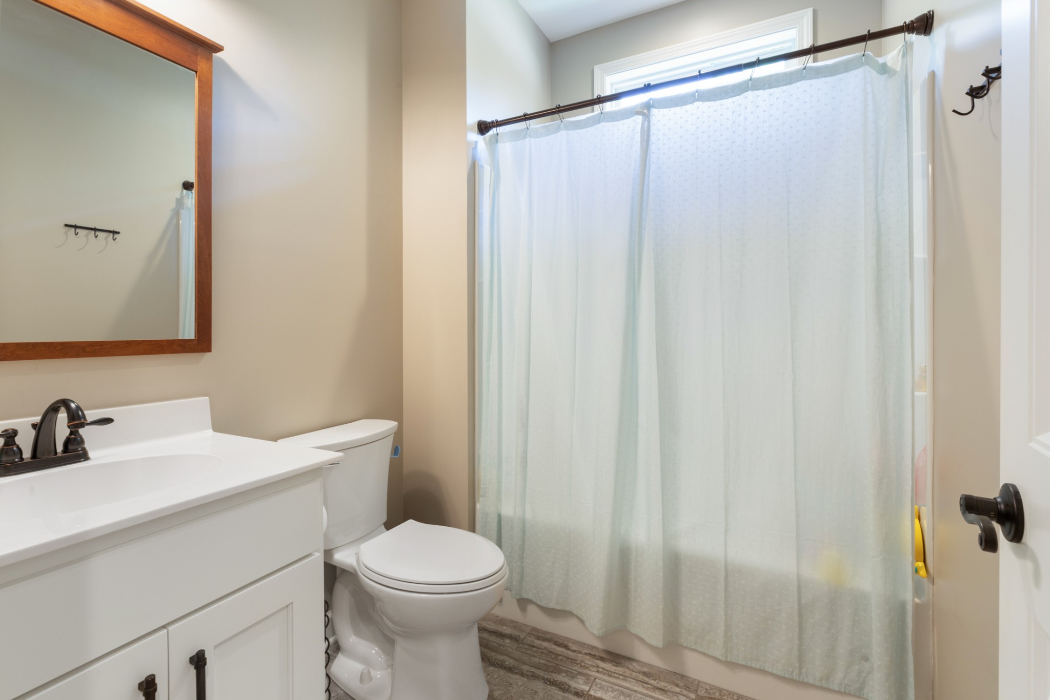 3215 Church Street Burns, TN 37029 - Photo 23 of 46 a bathroom with a sink a toilet and shower
