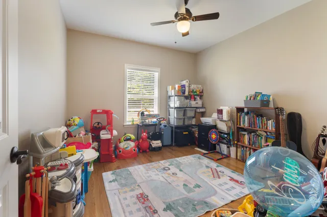 a bathroom with a window and a shower