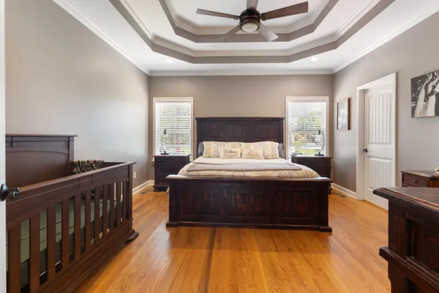 a bathroom with a double vanity sink and a large mirror