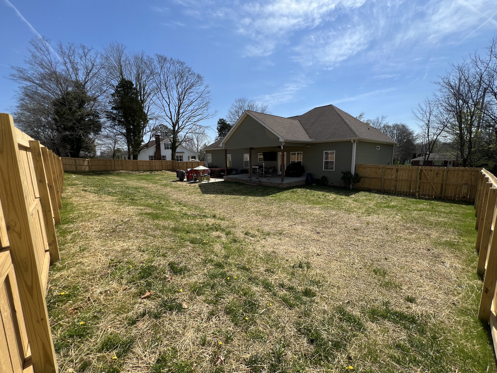 3215 Church Street Burns, TN 37029 - Photo 43 of 46 a view of a yard with a house in the background