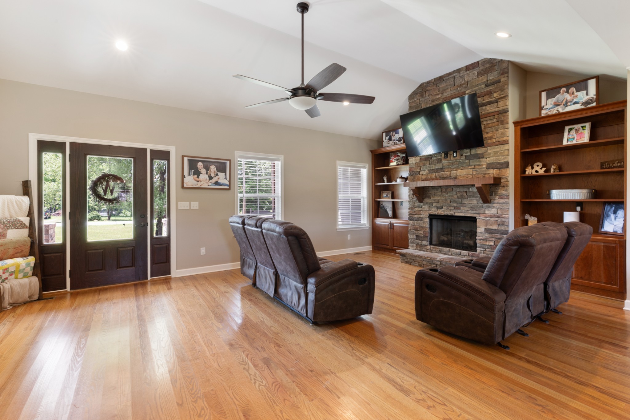 3215 Church Street Burns, TN 37029 - Photo 8 of 46 a living room with furniture a flat screen tv and a fireplace