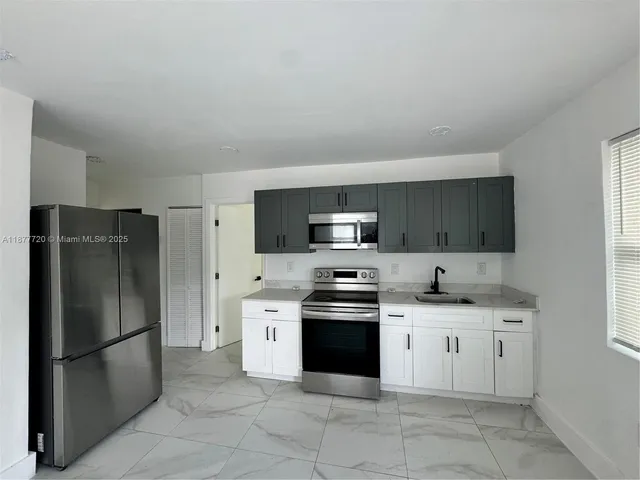 $2,850 | 1445 Northwest 34th Street, Unit 1445, Miami, FL 33142