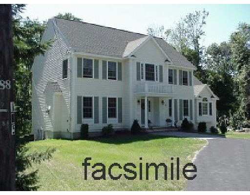 128 Argilla Road Andover, MA 01810 - Photo 1 of 1 a front view of a house with a garden and yard