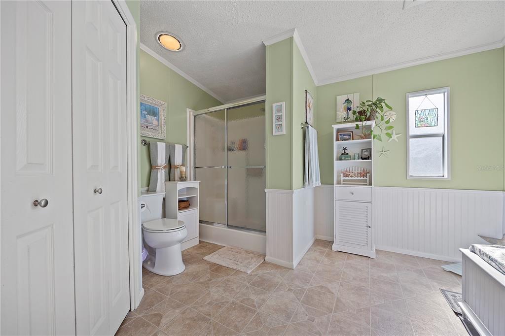 159 Southwest 70th Avenue Bell, FL 32619 - Photo 14 of 42 a bathroom with a toilet sink and shower